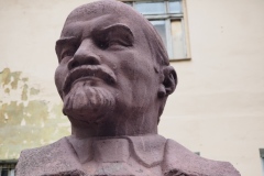 A bust of VI Lenin in a small pedestrian square