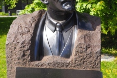Black, granite bust of VI Lenin