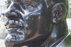 Black, granite bust of VI Lenin