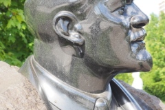 Black, granite bust of VI Lenin