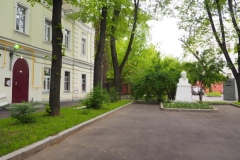 Bust of VI Lenin in small residential square