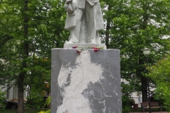 VI Lenin, standing with hand in his pocket