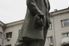 VI Lenin, standing with hand in his pocket
