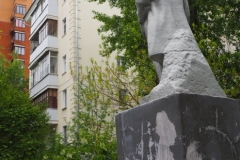 VI Lenin, standing with hand in his pocket