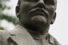 VI Lenin, standing with hand in his pocket