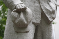 VI Lenin, standing with hand in his pocket