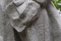 VI Lenin, standing with hand in his pocket